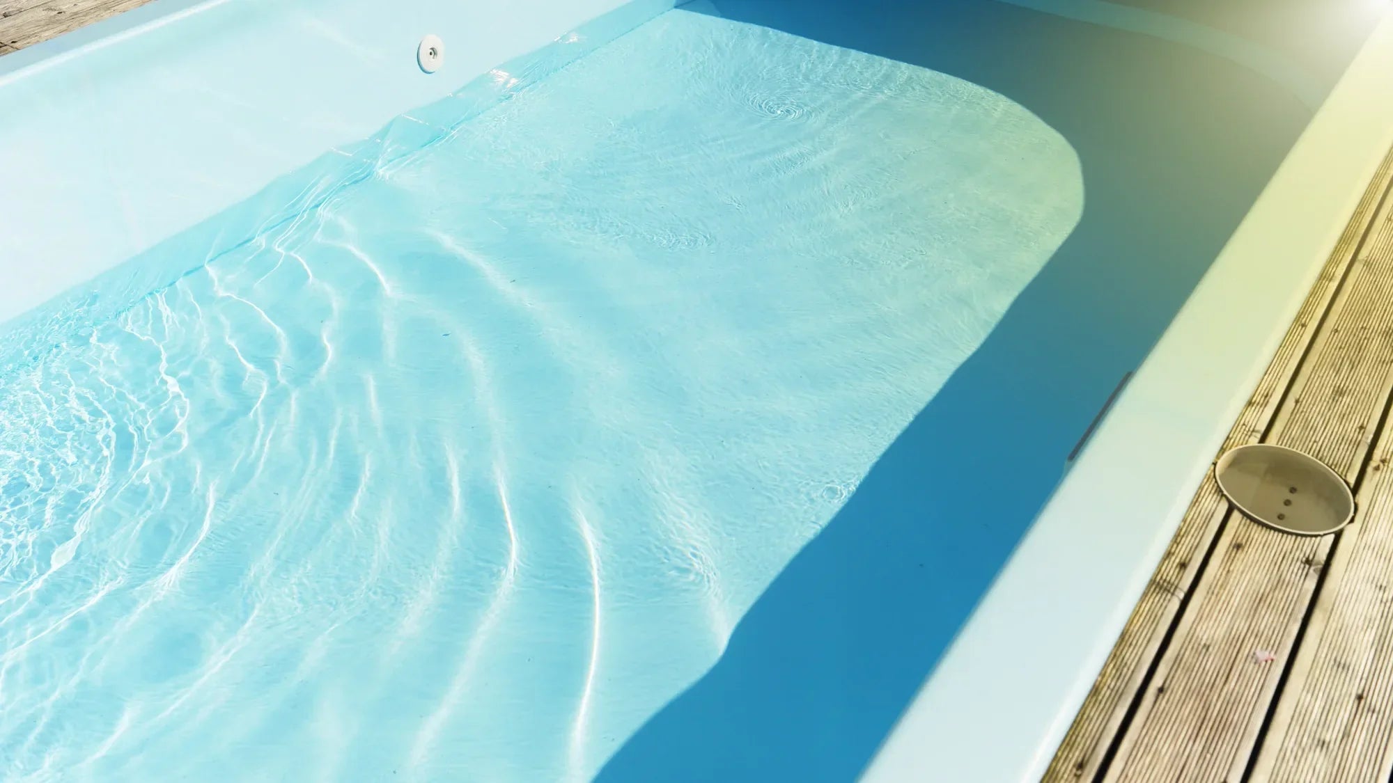 Preparing for Winter Shutdown: Should You Drain, Cover, Or Treat Pools Now?